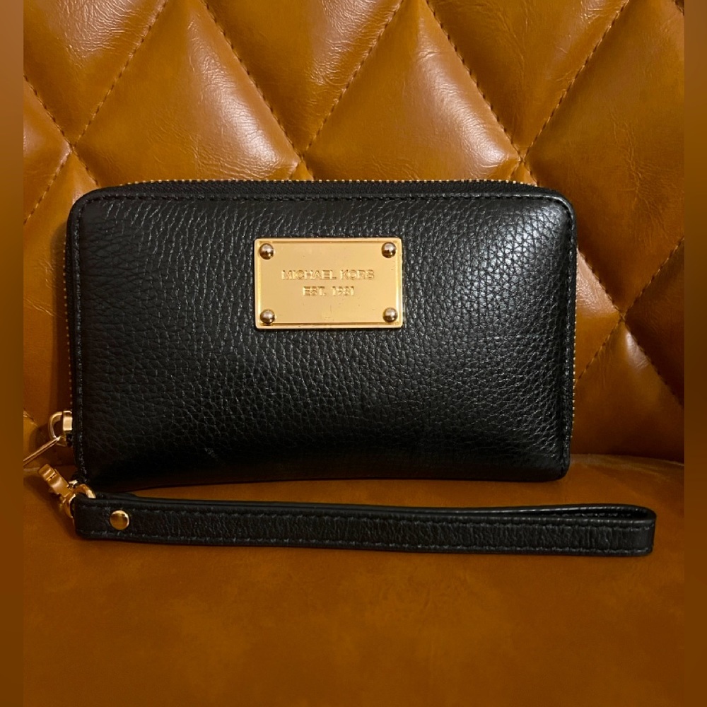 Michael Kors Wristlet black with gold hardware, pebbled leather material